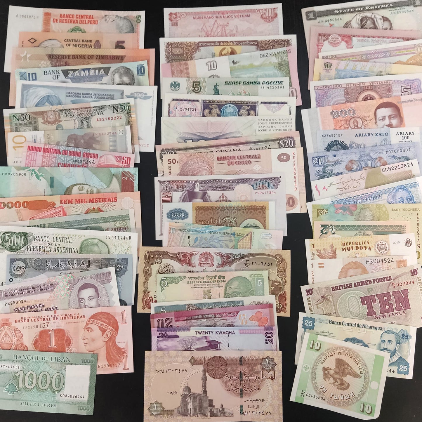 Moneda extranjera - 50 billetes de 50 países diferentes 