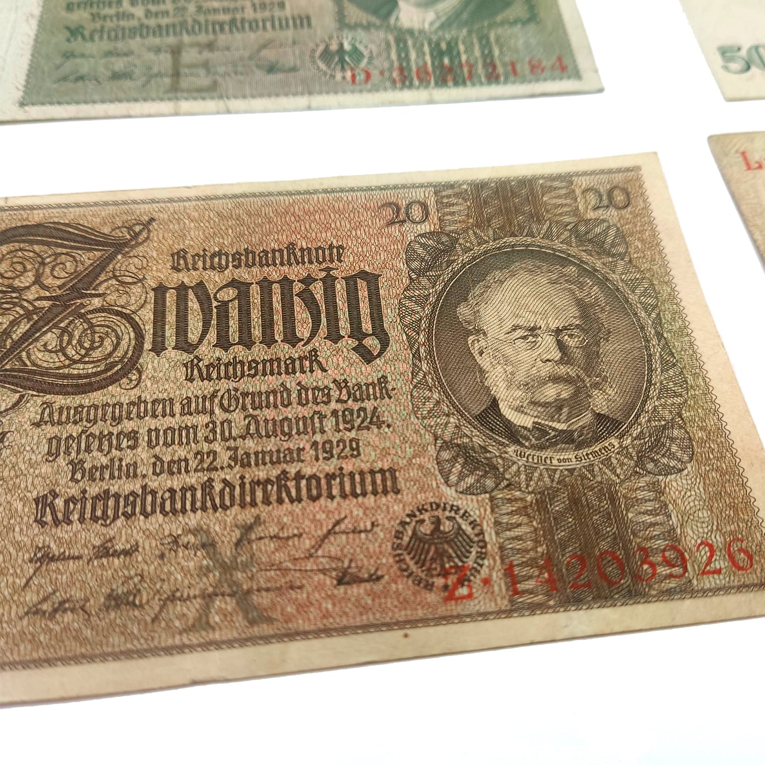 Four WWII German Reichsmark Notes dated 1929, 1929, 1933 and 1935. Certificate of Authenticity included