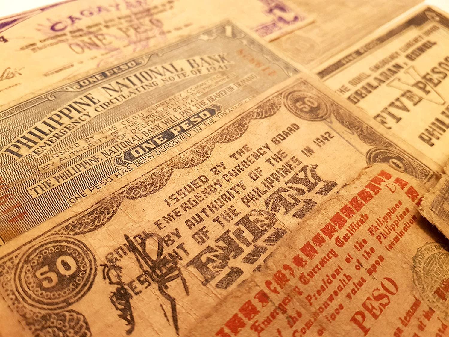 Weltwährung des 2. Weltkriegs – 10 Banknoten, die während des 2. Weltkriegs von der Guerilla verwendet wurden (Philippinen 1941–1945) – Das Todesurteilsgeld, Echtheitszertifikat 