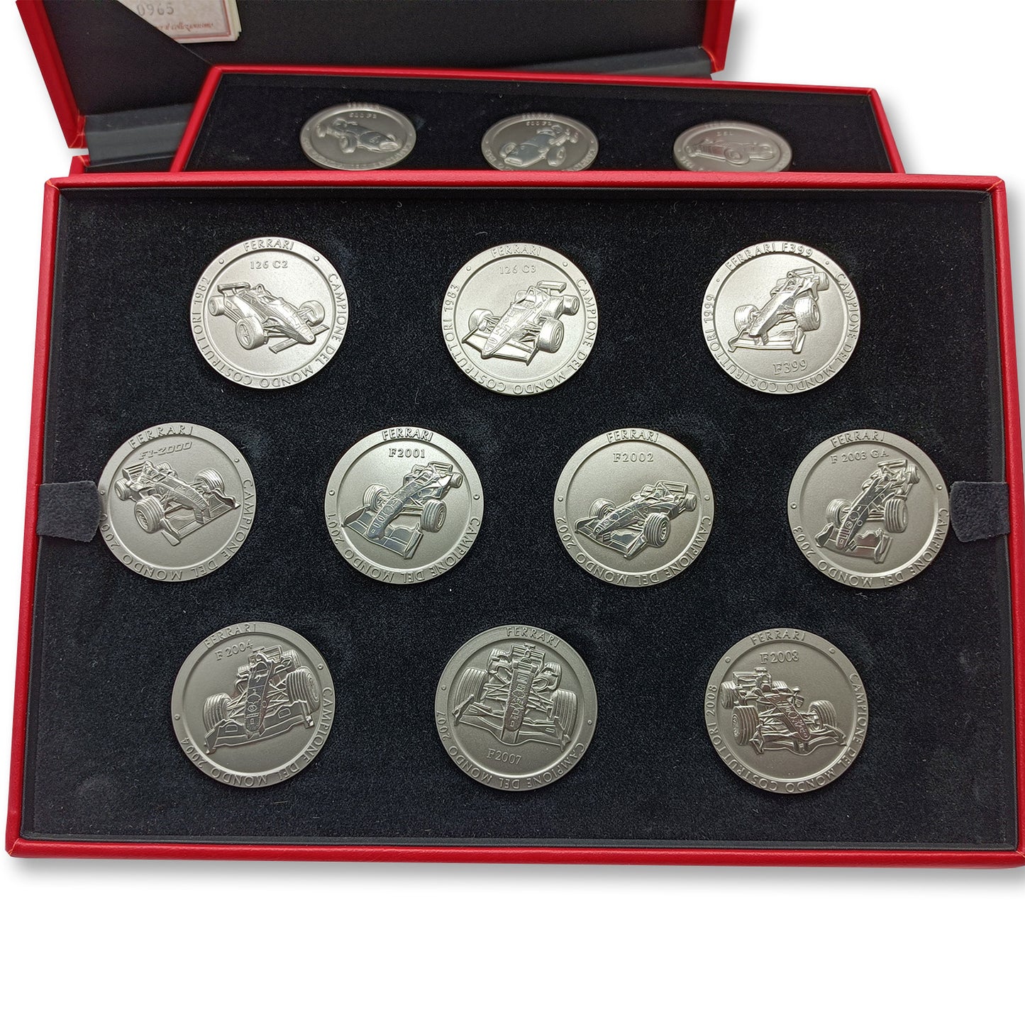 Colección de monedas Ferrari - 20 medallas oficiales de colección de Ferrari F1, campeonatos del mundo - Fabricadas en titanio - Monedas de F1 - Monedas coleccionables para coleccionistas - Monedas Ferrari 1952-2008 